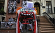 Political motivated Halloween decorations cover the entrance and exterior of a Murray Hill...