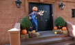 The entrance of a home is in the true spirit of Halloween with a variety of spooky things...
