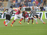 Chiellini (R - Juventus) and Gervinho (C - Rome) during the Serie A match between AS Roma and FC Juventus on May 11, 2014, at Rome's Olympic...