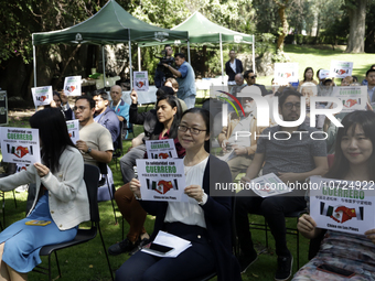 October 25, 2023, Mexico City, Mexico: Attendees of the China Cultural Festival in Los Pinos show posters in support of those affected in Ac...