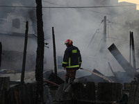 Fire service personnel from Bangladesh are currently extinguishing a fire in Baburhat, Narsingdi, Bangladesh, on October 30, 2023. This area...