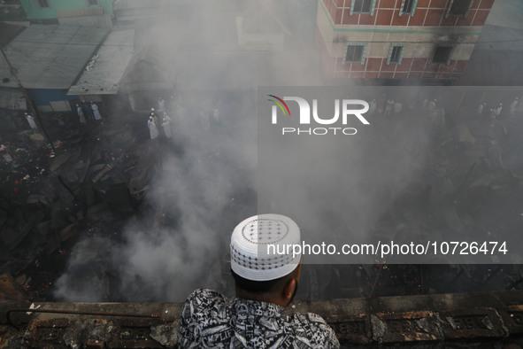 Smoke is billowing from a fire that is currently raging at one of the largest textile wholesale markets in Baburhat, Narsingdi, Bangladesh,...