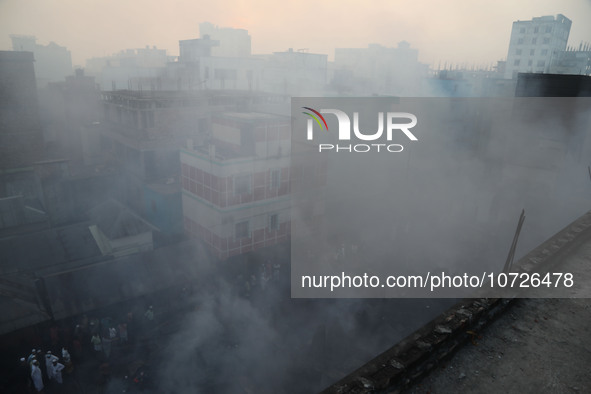Smoke is billowing from a fire that is currently raging in Baburhat, Narsingdi, Bangladesh, on October 30, 2023. This location is currently...
