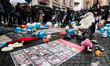 Empty strollers, symbolizing hostages and missing children, are being displayed during a d...