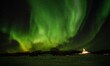 Northern Lights are seen reflected in the sky over the town of Lofoten, Norway. November 0...