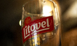 The Litovel Czech beer logo is seen on a pint glass in a restaurant in Warsaw, Poland on 1...