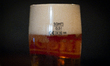 Froth, bubbles and beer are seen in a half liter or pint glass in Warsaw, Poland on 14 Nov...