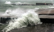 The waves of the Black Sea are hitting the jetties during a storm in Odesa, southern Ukrai...