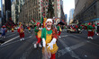 A member of the Santa's Toy Box Clowns is hitting the photographer with confetti during th...