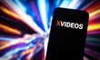 The Xvideo adulst website logo is seen in this photo illustration on 23 November, 2023 in...
