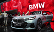 Visitors are looking at the BMW i5 at the 40th Thailand International Motor Expo 2023 in B...