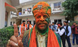 BJP workers are celebrating the party's win in the Rajasthan Assembly elections in Jaipur,...