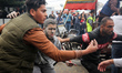 (EDITOR'S NOTE: GRAPHIC CONTENT) Medics are transporting the wounded to Al-Aqsa Hospital i...
