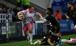 Bryan Byrne of Newcastle Falcons is running down the flank during the European Rugby Chall...