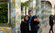 Tourists taking a selfie photo in Santa Chiara Cloister are seen in Naples, Italy, on Dece...