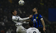 Robin Le Normand of Real Sociedad and Francesco Acerbi of F.C. Inter are competing during...