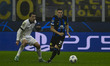 Mikel Oyarzabal of Real Sociedad and Kristjan Asllani of F.C. Inter are competing during t...