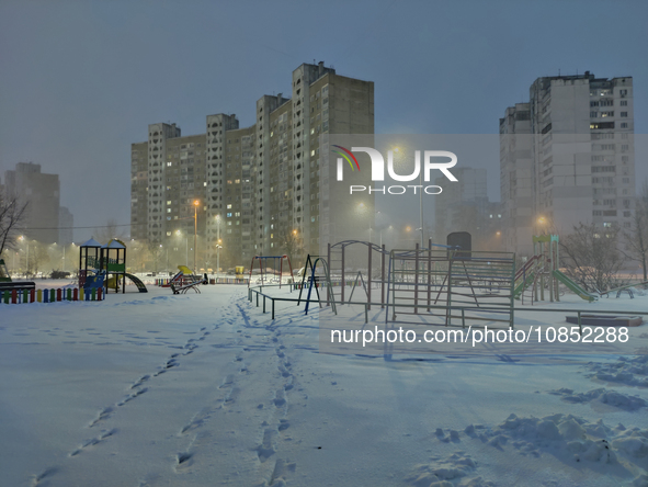 A snowy playground is seen in the evening in Kyiv, Ukraine, on December 14, 2023. 