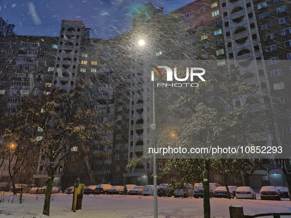 A residential high-rise building is seen during a snowfall in Kyiv, Ukraine, on December 14, 2023. 