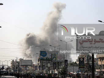 Smoke is rising over Nuseirat camp in the central Gaza Strip, on December 22, 2023, amid continuing battles between Israel and the militant...