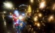 A Santa Claus with motorcycle riding goggles is seen illuminated  in Warsaw, Poland on 22...