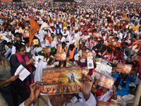Supporters of the Bharatiya Janata Party (BJP) and Hindu devotees are participating in the 'Lokkho Konthe Gita Path' (One Lakh Bhagavad Gita...