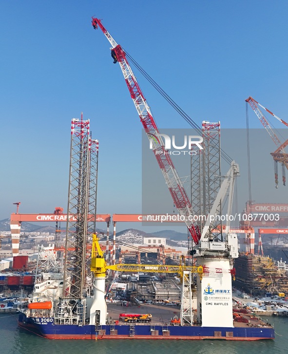 The ''Bo Qiang 3060'' wind power installation ship is getting ready to depart at the CIMC Raffles Yantai construction base in Yantai, Shando...