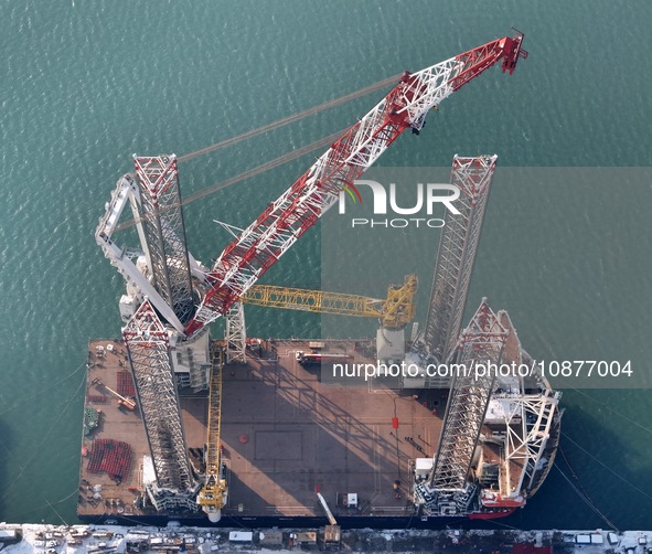 The ''Bo Qiang 3060'' wind power installation ship is getting ready to depart at the CIMC Raffles Yantai construction base in Yantai, Shando...