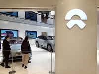 Citizens are experiencing an ET5 car at NIO's electric car store in Shanghai, China, on March 19, 2023. (