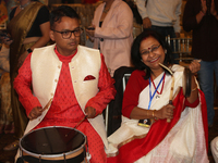 Bengali Hindus are playing a rhythmic tune during the Durga Puja festival at a pandal (temporary temple) in Mississauga, Ontario, Canada, on...