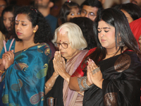 Bengali Hindus are offering prayers during the Durga Puja festival at a pandal (temporary temple) in Mississauga, Ontario, Canada, on Octobe...