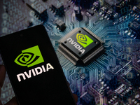 The NVIDIA logo is being displayed on a smart phone, with an NVIDIA chip visible in the background, in this photo illustration taken in Brus...