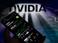 The stock price of NVIDIA Corporation on the NASDAQ market is being displayed on a smartphone, with NVIDIA visible in the background, in thi...