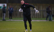 Darlington goalkeeper Tommy Taylor is warming up ahead of kick-off during the Vanarama Nat...