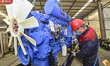 A worker is assembling a generator at a manufacturing enterprise in Qingzhou, East China's...