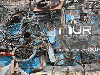 Bicycles and scrap metal are adorning a building in downtown Toronto, Ontario, Canada, on August 5, 2023. (