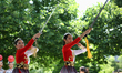 Chinese dancers are performing a traditional classical dance in traditional outfits in Uni...