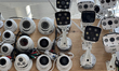 Surveillance cameras are being displayed outside a home security shop in Markham, Ontario,...