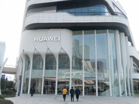 Customers are walking past the most beautiful Huawei flagship store in Shanghai, China, on January 2, 2024. (