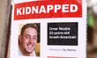 An image of Omer Neutra, an Israeli-American hostage kidnapped by Hamas is hanging on a ga...