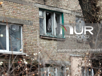 A window is broken as a result of a Russian missile attack in a residential building in the Dorohozhychi district, in Kyiv, Ukraine, on Janu...