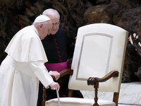 Pope Francis is arriving for his weekly general audience in the Pope Paul VI hall at the Vatican, on January 3, 2024. (