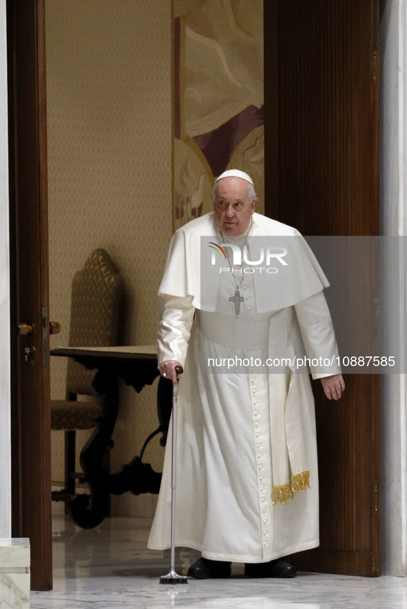 Pope Francis is arriving for his weekly general audience in the Pope Paul VI hall at the Vatican, on January 3, 2024. 