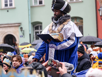An actor who plays one of the Wise Man, perform Nativity Play on the street of Old Town of Krakow, Poland on January 6, 2024. January 6 is P...