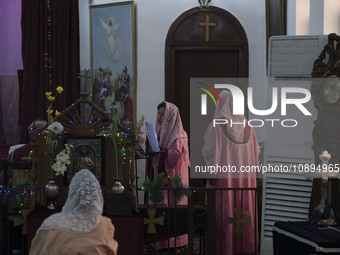 Iranian-Armenian clergywomen are preparing to observe a Christmas mass prayer ceremony at the St. Vartan Armenian Church in central Tehran,...