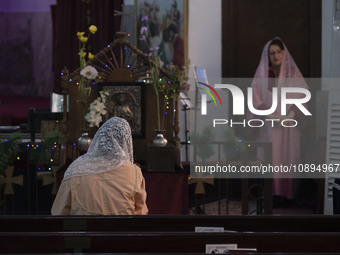 Iranian-Armenian clergywomen are preparing to observe a Christmas mass prayer ceremony at the St. Vartan Armenian Church in central Tehran,...