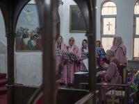 Iranian-Armenian clergywomen are performing at the St. Vartan Armenian Church in central Tehran during a Christmas mass prayer ceremony on J...