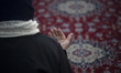 An Iranian-Armenian worshipper is praying at the St. Vartan Armenian Church in central Teh...