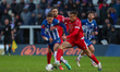 Joe Grey of Hartlepool United is battling for possession with Seydil Toure of Oxford City...