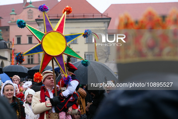 A procession is moving through the city streets during the Epiphany celebrations in Krakow, Poland, on January 6, 2024. Epiphany, celebrated...